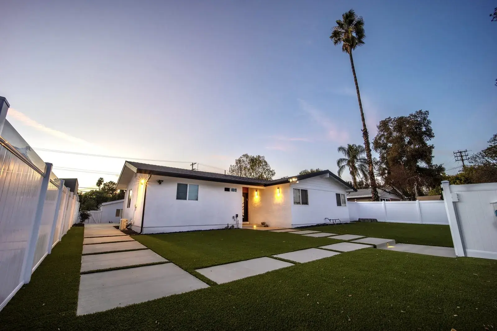 Home addition exterior with matching roof